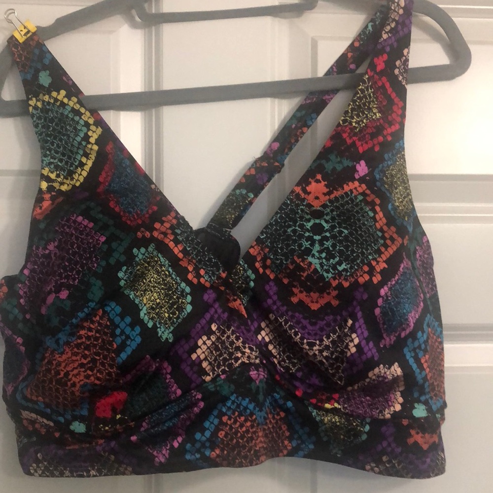 Torrid swim top.  Black with multicolored snake skin print.  Size 4